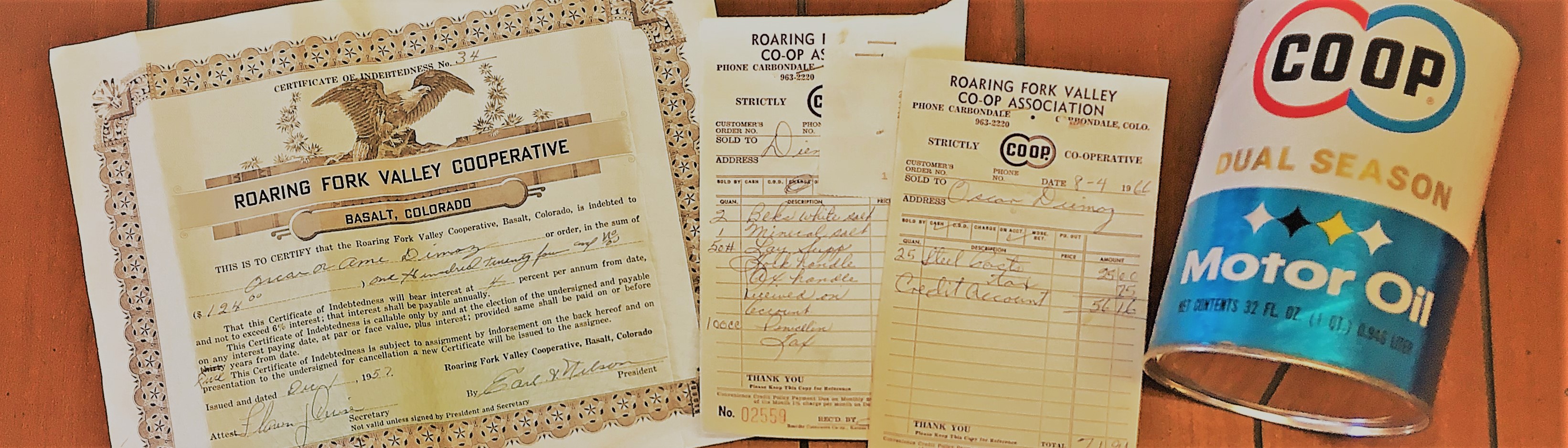 Co-op documents from the 1950s and 1960s and a can of Co-op motor oil